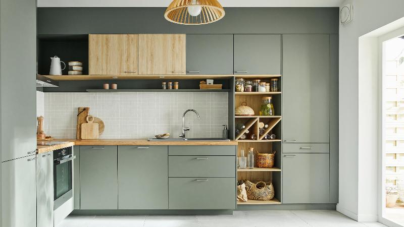 Architecture cuisine moderne ouverte sur le salon, ambiance conviviale et lumineuse, idéale pour la réception d’invités et les repas partagés